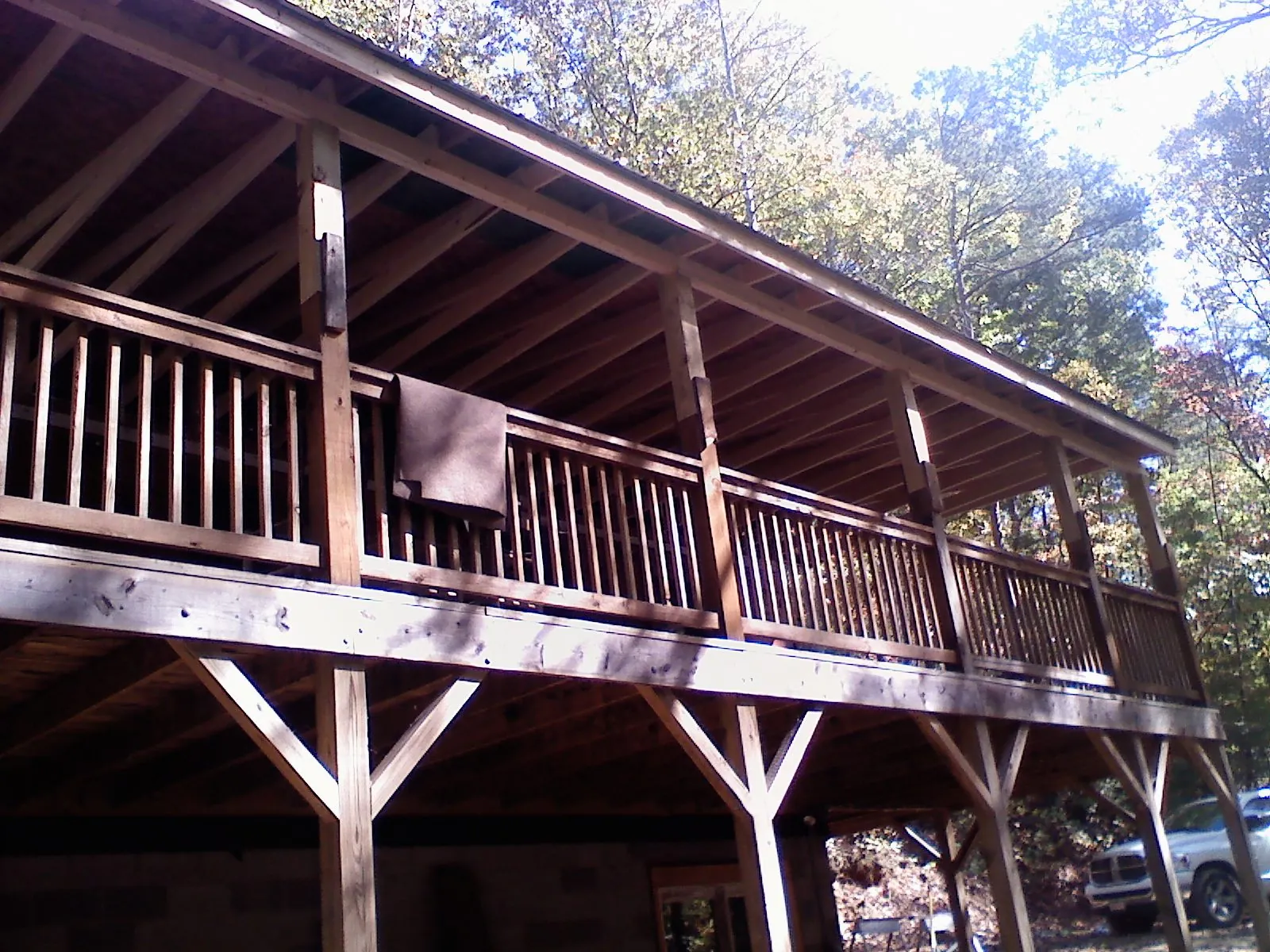 Timber framing under a new elevated porch and deck — Roof Leak Repair in Flag Pond by Roofing Brothers